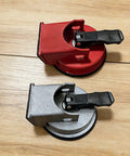 DIY Easy Grip Suction Cup Floor Repair Tool For Quick Fixes At Home Without Pros Millimeter Precision Positioning Durable ABS And Rubber Build Great For Rentals And Renovations, red and gray variants, on wood surface.