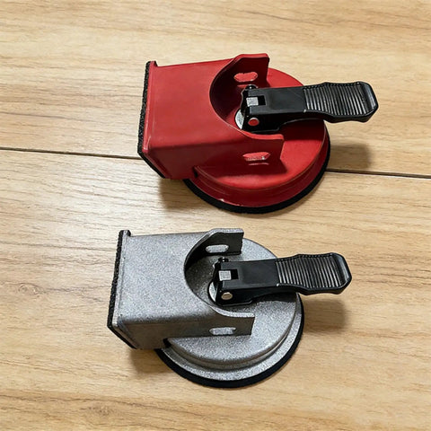 DIY Easy Grip Suction Cup Floor Repair Tool For Quick Fixes At Home Without Pros Millimeter Precision Positioning Durable ABS And Rubber Build Great For Rentals And Renovations, red and gray variants, on wood surface.
