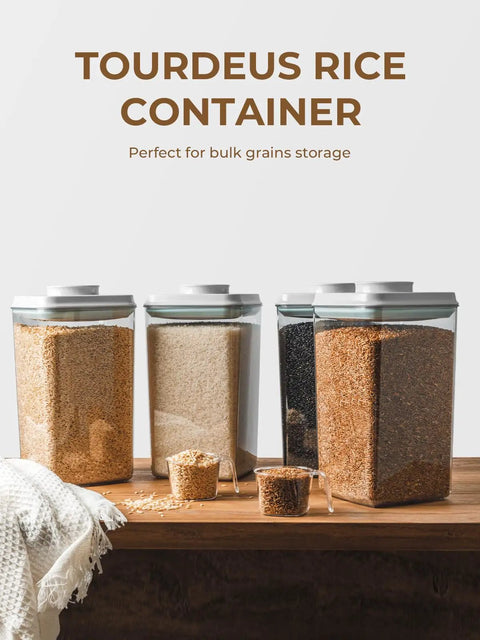 Airtight Food Storage Containers With One Hand Pop Lid Four Pack Four Point Two Two Quart Stackable Large Modular Organizers With Measuring Scoops BPA Free For Rice Flour Baking Supplies Snacks And Laundry Pods on wooden table with grains.
