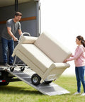Heavy Duty Stair Climbing Cart With Smooth Tri Wheel Design For Crushing Heavy Moves And Furniture Hauls No Sweat Rolling Platform Truck moving a sofa.