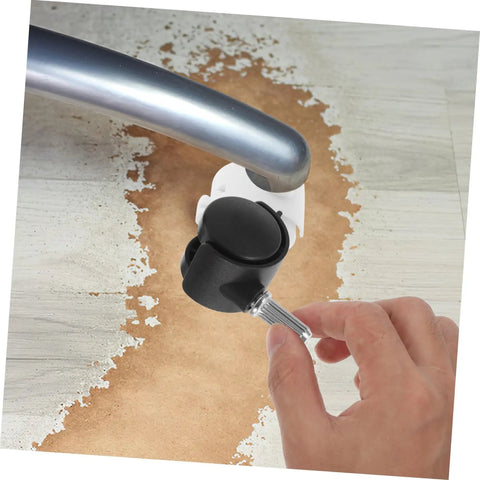 Hand installing a Four Pack Swivel Caster Wheels With Locking Brakes, Heavy Duty Polyurethane Replacement Wheels for furniture.