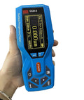 Grab And Go Digital Surface Roughness Meter With Curved Sensor And Steel Stand For Cylindrical Parts Offering Dead Accurate Readings Plug And Play USB Connection Shop Ready Workhorse Design held in hand showing OLED display and controls.