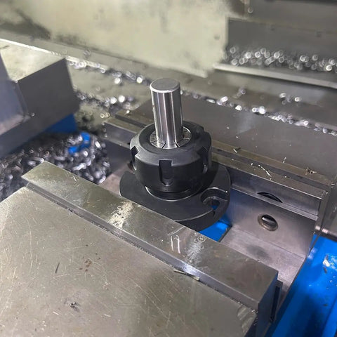 Close-up of ER25 Adjustable Drill Holder for CNC Lathes securely mounted in a machine, showcasing its 1-inch shank and collet style.