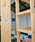 Heavy Duty Straight Corner Braces Forged From Top Shelf Stainless Steel Metal Frame Anchors on a wooden shelf structure.
