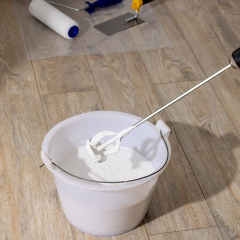 Heavy Duty Drill Paint Mixer Set Of 2 Paddles blending white paint in a bucket, compatible with standard drills for fast even mixing.