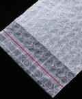Fifty Pack Small Bubble Mailers 10x10 Plus 3cm Self Seal Padded Envelopes Double Layer Thickened Shockproof Shipping Bags close-up