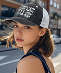 Woman in street wearing Funny RV Traveler Hat For Women With Caravanning Sayings Perfect Gift For Road Trippers And Campers