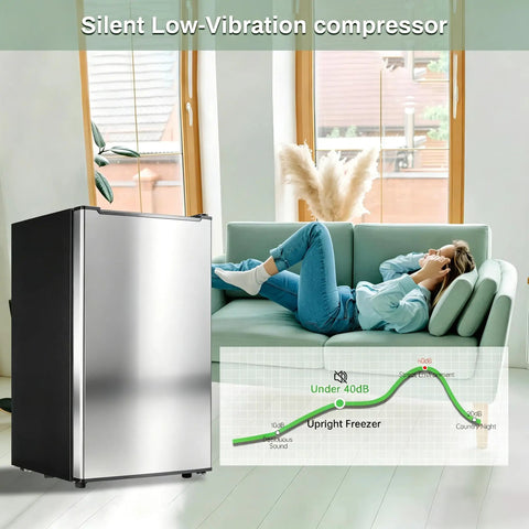 Effortless 3.6 Cu Ft Upright Freezer Glossy Silver with silent low-vibration compressor in modern living room setting.