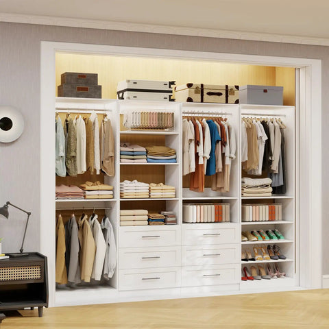Slick Modular Closet System That Gives Your Bedroom A Major Wardrobe Flex Featuring Six Mega Drawers Eight Stretch Hanging Rods And Adjustable Shelving Towers White Four Piece Kit with hanging clothes and organized shoes.