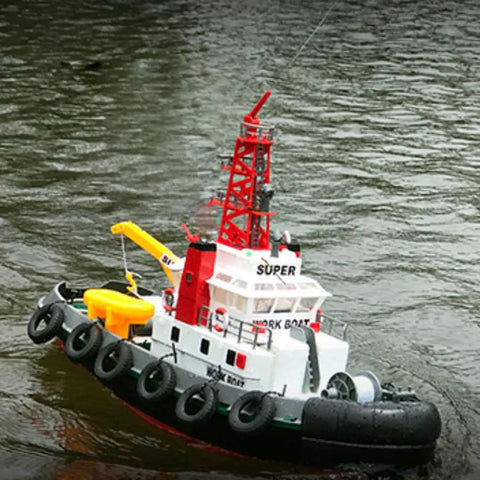 Heng Long 2.4G RC Fire Fighting Boat With Water Spray Cannon on water, red and white design, durable build for hobbyists, realistic model.