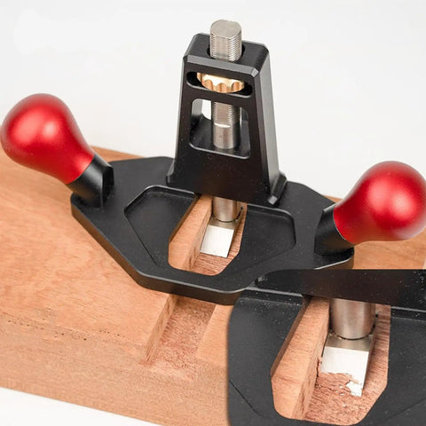 Tough As Nails Handheld Router Plane Featuring Adjustable Stainless Steel And Ebony Blades on wood for precise edge trimming.