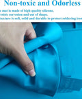 Hand holding flexible Heat Resistant Silicone Soldering Work Mat For Electronics Repair, Withstand Up To 932 F in blue, non-toxic material