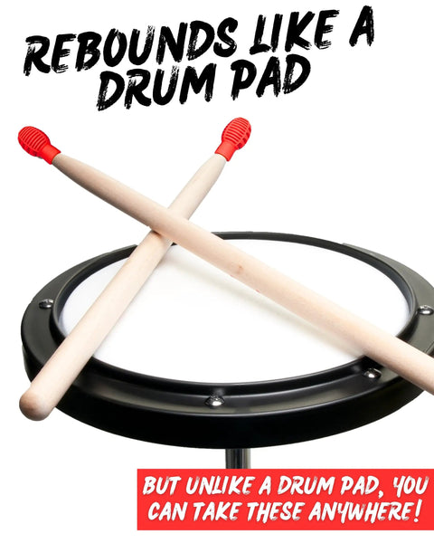 Silicone Drumstick Dampeners Replace Pads Quiet Practice Mute Tips 4 Pack on drum pad, showcasing red silicone tips and wooden sticks.