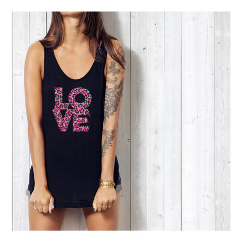 Woman wearing black tank with pink glitter animal pattern heat transfer vinyl tiger print reading 'LOVE' design