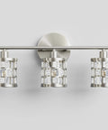 Three Light Brushed Nickel Vanity Light Fixture With Cylinder Crystal Shades Over Mirror Slick Modern Wall Sconce For Bathroom