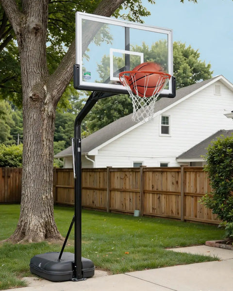 Basketball hoop in backyard setup showing Heavy Duty Replacement Basketball Rim 18 Inch Solid Steel Pro Grade Hoop Rim For Wall Mount And Backboard Replacement With Double Spring Design And Heavy Duty Net Includes Complete Installation Kit Game Ready For Fast Setup.