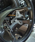 46 Piece Steering Wheel Puller Kit for Harmonic Balancers, Crank Pulleys, Gears and 4 Way Slotted Puller shown in use on steering wheel.
