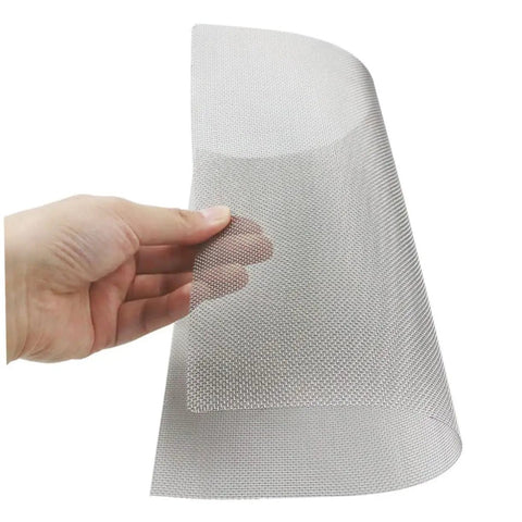 Hand holding 16 Pieces Stainless Steel Welding Mesh Screen For Automotive Bumper Repair Reinforcing Mesh Quick Fix And Seamless Restoration Of Car Damage Durable And Easy To Weld For Fast Bumper Repairs On Cars And Trucks