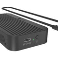 Dang Fast M.2 NVMe SSD Enclosure With Integrated Cooling Fan, black, showing USB ports and cooling feature.