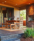 Real Deal Wet Look High Gloss Concrete And Paver Sealer For Exterior Patios Featuring Five Gallon Container in a stylish patio setting.