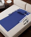 Super Smooth Electric Lifting Bed Backrest With Foldable Armrests and Power Adjustable Wedge Mattress For Elderly Patients To Sit Or Sleep Cool Blue setup on a bed with pillow and cables.