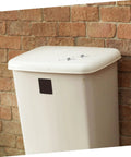Grab A Sweet Set Of 20 Trash Can Spring Kits For Smooth Silent Lid Operation, Featuring Sturdy Stainless Steel Torsion Springs With Easy Install To Repair Home Office Garbage Bins And Save Cash On Replacements Today. white trash can lid with two stainless steel springs on a brick wall