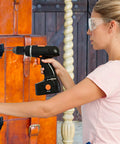 Person installing 2 Pack Small Hasp Latches for Wooden Boxes and Cabinets using a drill on a wooden chest