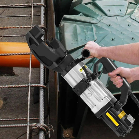 Want A No Hassle Setup This Heavy Duty Electric Rebar Bender Knocks Out Quick Hydraulic Steel Bends Up To 25Mm With Smooth 130 Degree Swings and Rock Solid 1500W Power For Real Pros showing handling of an electric rebar bender.