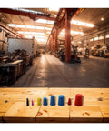Solid Silicone Rubber Tapered Plugs Assortment Kit 125 Piece Heavy Duty Stopper Set For Painting Oiling And Hydraulic Impregnation Tasks That Hold Up To Heat And Wear Without Flaking Or Shrinking Out There. assorted colored silicone tapered plugs on workshop table