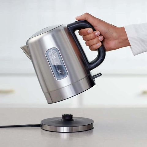 Fast Boil Electric Kettle For Tea And Coffee, Stainless Steel BPA Free, 1 Liter Capacity being lifted from base