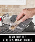 Person using 7 Inch Wet Tile Saw With HydroLock Water Containment System for precise bevel cuts on a tile