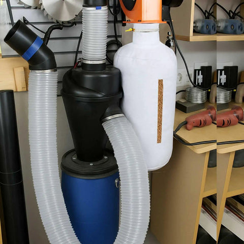 Dust Collection Kit with Heavy PVC 4 Inch Hose 10 Ft Long shown in a garage setup