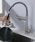 Dope Contemporary Single Handle Kitchen Sink Faucet With Pull Down Sprayer And Pre Rinse Style in brushed nickel while rinsing pan.