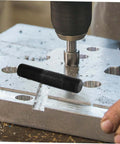 Hydraulic Punch Driver Kit Knockout Tool for Electrical Conduit and Metal Sheet Punching in action on metal surface