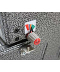 Close-up of adjustment knob on heavy duty electric coil punch machine for bindery with 4x5mm oval holes and 54 disengageable pins