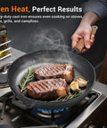 12 Inch Cast Iron Skillet With Removable Wooden Handle Pre Seasoned Fry Pan on stove with steak and garlic cooking