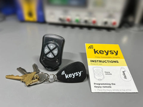RFID Duplicator For 125kHz Key Fobs And Cards Copy Up To Four Access Badges Into A Rewritable Fob with Keysy remote and manual