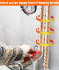 Person wrapping 32.8 Ft Pipe Insulation Tape Wrap With Aluminum Foil Self Adhesive Foam around outdoor pipe to prevent freezing