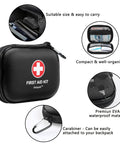 Mini First Aid Kit 120 Piece Waterproof Hard Shell Medical Kit for Car Home Office Travel Camping Sports Outdoors and School Grab And Go Emergency First Aid Supplies And Survival Kit In Compact Portable Case Black shown with organized compartments and carabiner clip.