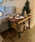 Wooden table with 26 Inch Hairpin Table Leg Set With One Half Inch Diameter Three Rods Beefy Black Furniture Feet.