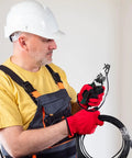 Solid Grip Multifunctional Wire Stripper And Crimper Pliers All In One Cable Cutter for electrical work in gloved hand.