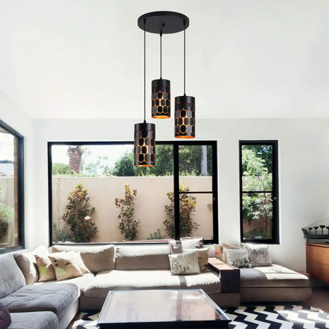Living room with 3 Light Modern Kitchen Island Pendant Lights With Cylindrical Metal Cage, Industrial Round Base Multi Pendant Fixture.