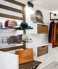 Four Piece Metal Hat Display Racks For Slat Wall Measuring 13 By 7.9 By 3.8 Inches showcasing baseball hats in a closet