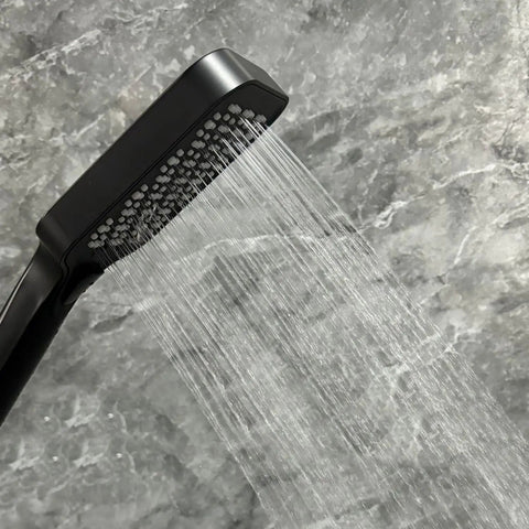 Upgrade Your Bathroom with This Matte Black Handheld Shower System - Adjustable Slide Bar & Hose High-Pressure Spray Easy-Clean Silicone Nozzles pouring water.