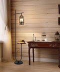 Vintage Floor Lamp With Built-In Table And Arc Lantern In Rustic Bronze Gold Finish beside wooden desk