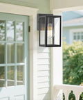 Exterior Wall Lantern Outdoor Sconce For Porch And Patio Lighting, Weather Resistant Black Finish, mounted on a porch wall