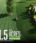 Person using Electric Riding Lawn Mower 42-Inch Deck Cordless Tractor With Six 56V 6.0Ah Batteries on large green lawn