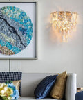 Drip Up Your Wall Decor Game With This Modern Crystal Wall Sconce Featuring A Solid Metal Build And Versatile E14 Socket in living room setting.