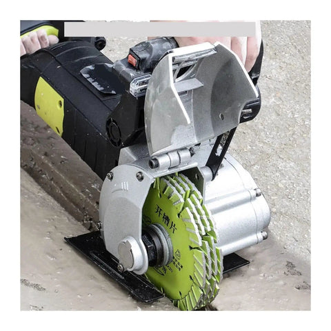 Close-up of Badass Heavy Duty Electric Slotting Machine And Groove Cutter with green blade cutting through concrete.