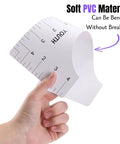 Hand holding youth size ruler from T Shirt Alignment Ruler Kit For Vinyl Designs 4 Piece PVC Ruler Set For Centering Graphics On T Shirts Heat Press Accessories Includes Adult Youth Toddler And Infant Sizes Durable Reusable, highlighting flexibility.